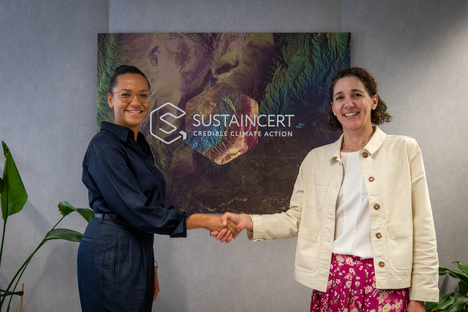 Dr. Céline Bilolo and Marion Verles at SustainCERT's offices in Luxembourg, marking TÜV SÜD's acquisition of SustainCERT.