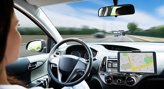 Autonomous driving car with woman as driver