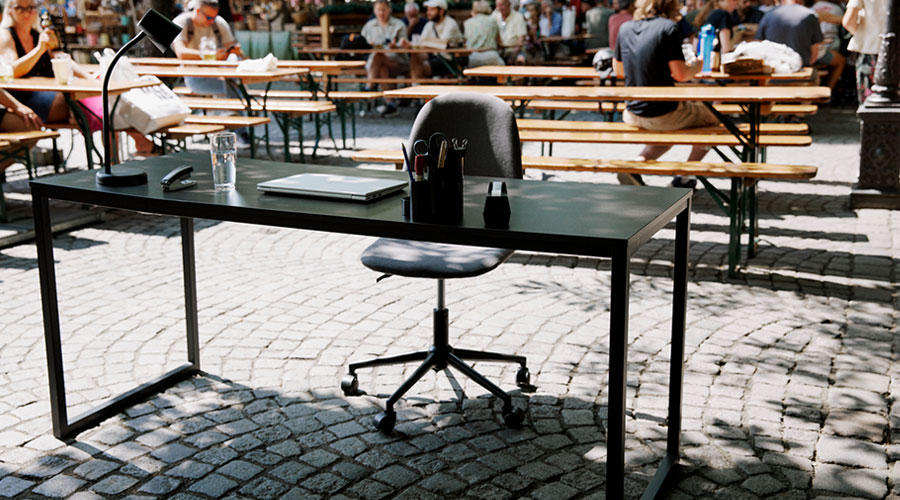 A desk and a desk chair in a Bavarian beer garden