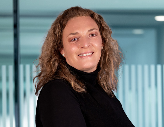 Sara Brandimarti: A woman in a black jumper smiles at the camera.