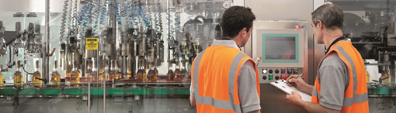 Engineers inspecting machine