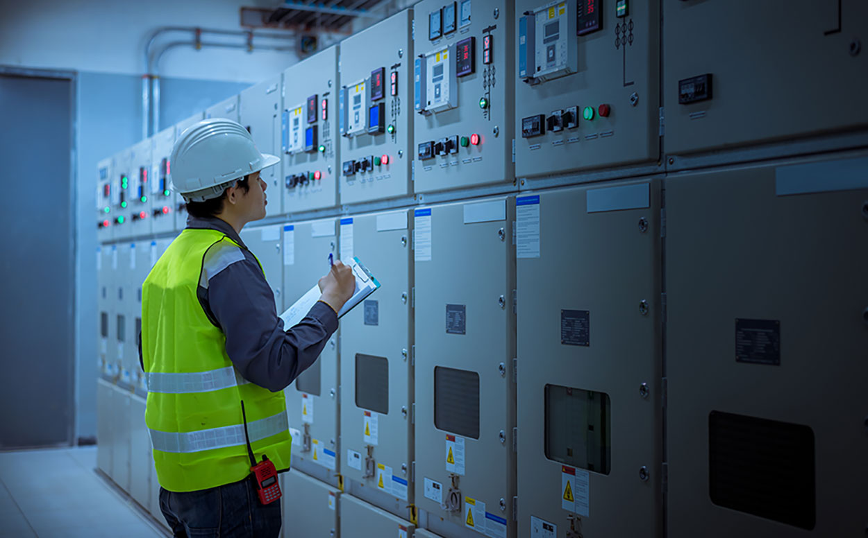 man doing field inspection for UL508 certification