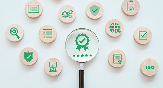 Lens enlarging quality icon highlighting the importance of sustainable quality management systems