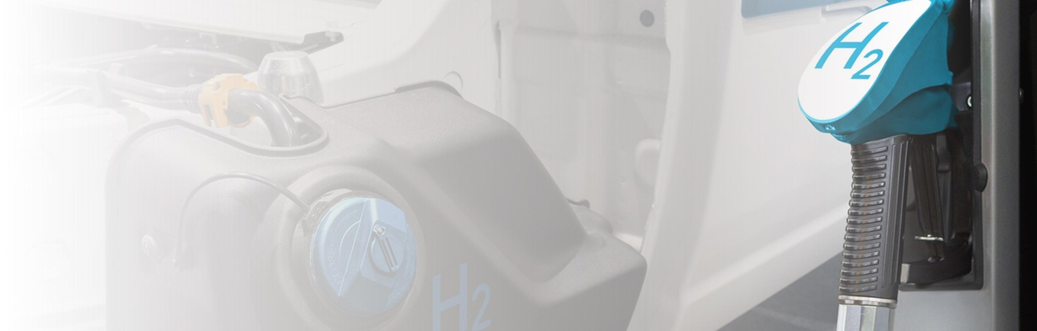 Hydrogen truck is charging hydrogent tank at hydrogen charging station