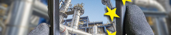 Image of an industrial plant with pressure equipment and yellow European stars Image of an industrial plant with pressure equipment and yellow European stars